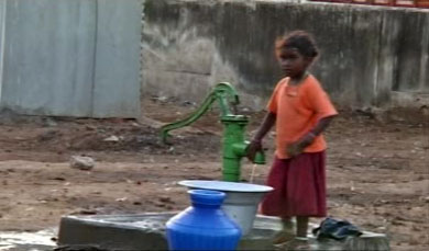 Girl at water pump