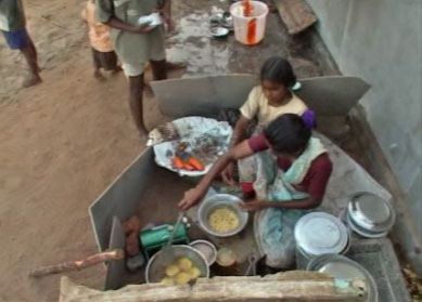 Woman cooking outside