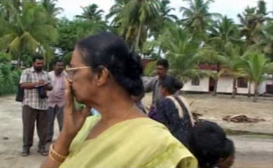 Woman in yellow sari