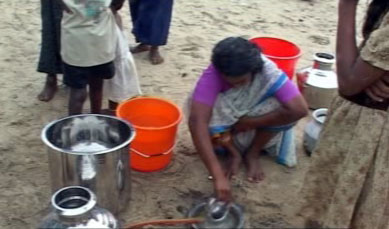 Woman with water containers